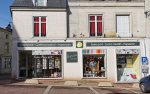 Une photo de l'entreprise (bureau, atelier, façade, carte de visite, ...)